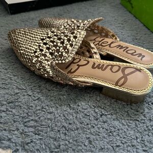 Cute gold flats. Never worn.